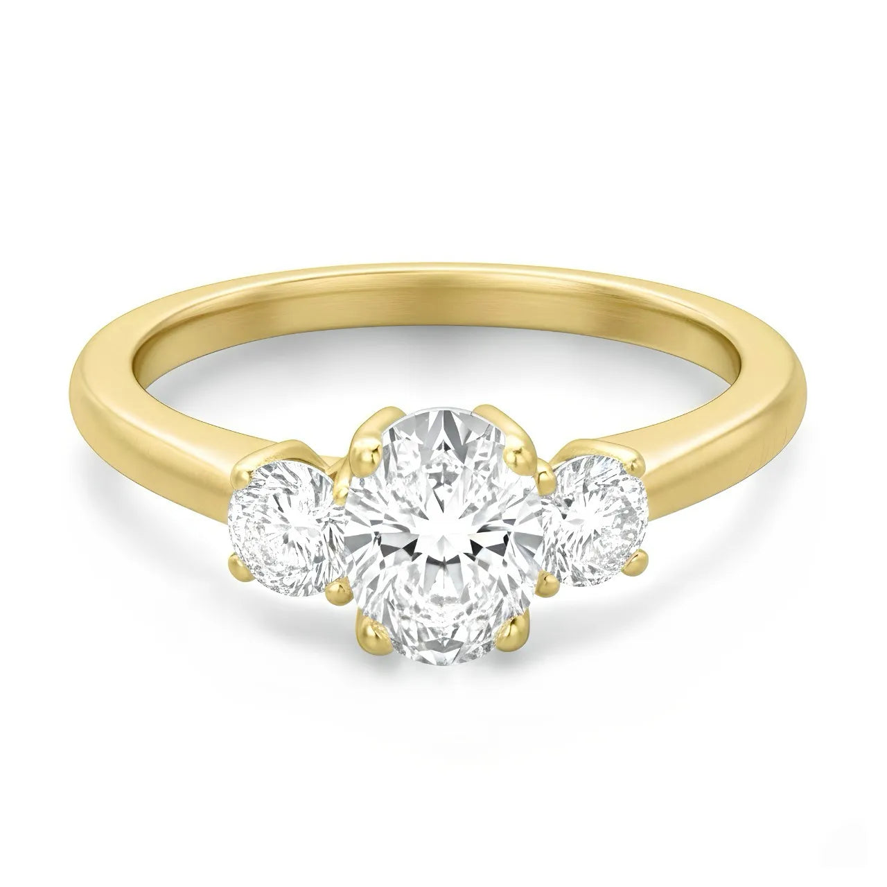 Yellow gold ring with a large round lab-grown diamond center stone and two smaller side diamonds